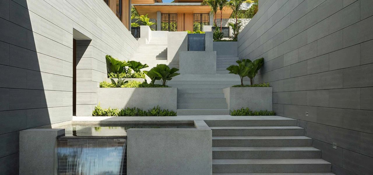 Stone staircase and water feature at Avadina Hills